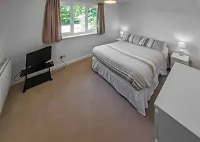 Single storey cottage in its own secluded setting away from the lodges. - Image 3