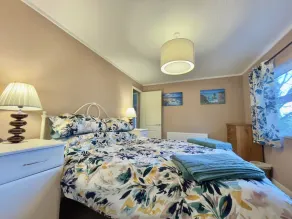 Luxury lodge situated on a tranquil holiday park - Image 5