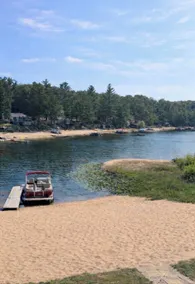 Lakefront Cottage with Private Sandy Beach, Decks & Fire pit - Sleeps 10 - Image 5