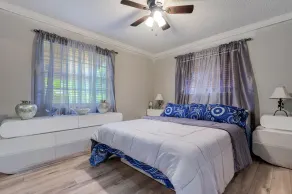 HIDDEN GEM! Spacious 4BR/2B Home W/ Pool and Garage - Image 4