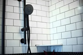 HostWise Stays - Prime Location in Lawrenceville, Exposed Brick 2BR Home - Image 5