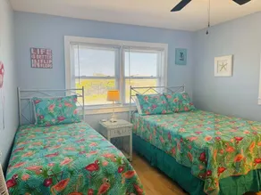 Enjoy oceanfront bliss at When Pigs Fly, a spacious 4BR gem in Holden Beach, NC. - Image 4