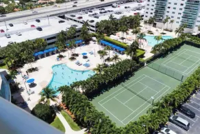 Entire condominium with a pool view, steps from the beach - Image 4