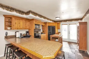 Two level condo with gourmet kitchen, upstairs remodel, and outdoor wonderland.  - Image 5