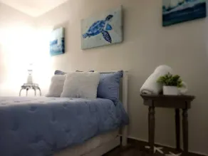 Our beach house harbors a relaxed, soft, modern environment. - Image 5