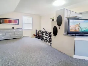 Entire tri-level home with a king master and patio - Image 2