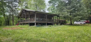Watch the birds on a wrap-around porch. Very private and pet friendly. - Image 5
