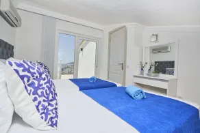 Mavi Kelebek is a lovely 2 bed apartment with shared pool and sea views - Image 4