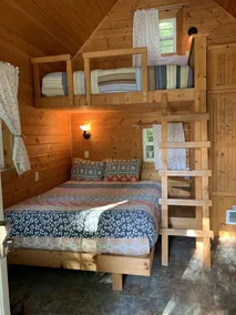 Glamping at its finest in an adorable tiny home cabin that sleeps up to three! Shared hot tub. Beautiful property surrounding the cabin. Short stroll to Copper Creek. Walking distance to Copper Creek Restaurant. 2 miles to Mt Rainier National Park. - Image 4