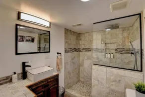 Panorama | Sweeping Bighorn Mountain Views | Spacious 3-Bedroom Walk-Out Retreat | Renovated Spa Bathroom | Western Living Room with Log Accents | Sheridan Wyoming Vacation Rental - Image 4