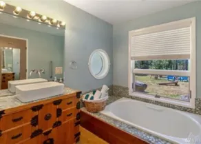 Luxury four bedroom home on sixteen acres of wooded privacy. - Image 2