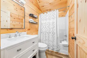 Cabin #8: Studio style layout with kitchenette and a large gravel parking pad beside the cabin for easy boat or trailer storage. - Image 3
