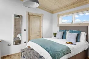 A stunning pet-friendly one-bedroom lodge with open plan living, private deck and hot tub. - Image 5