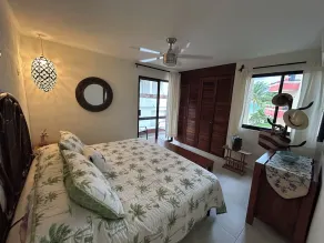 PlayaSol Beachfront Condo with large pool, steps to beach,  walk to town square - Image 5