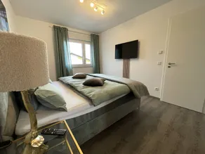 Modern and centrally located holiday apartment with a large balcony. - Image 5