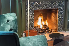 Located in the Munger Place Historic District, this remodeled gem blends timeless elegance with modern comfort. Accommodates guests with a cozy queen-size bed, luxury linens, leather sofa, high-speed internet, and top-tier appliances. - Image 3