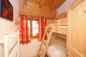Staudi's ski hut vacation apartment Top1 in hut style directly on the slopes Stove - Image 3