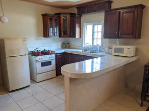 Smile Tangerine - One Bedroom Apartment - King Bed - Secure  Centrally Located - Image 5