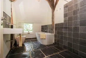 Romantic thatched-roof house with wellness area near the dyke - Image 5