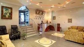 Palmland Hotel Suites - Image 3