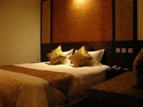Baolong Homelike Hotel Jinian Branch - Image 2