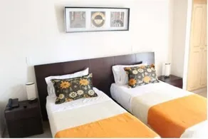 Hotel Suites El Lago Inn - Image 5