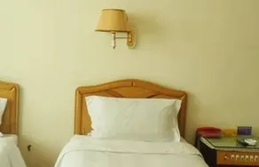 Magnolia Business Hotel (Yantai Longkou Heping Road Branch) - Image 2