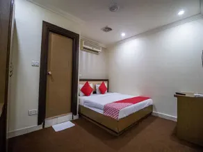 Imax Inn by OYO Rooms - Image 4