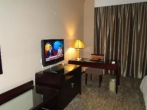 Huanlian Lucaihuang Business Hotel - Image 4