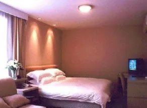 Baolong Homelike Hotel Jinian Branch - Image 5