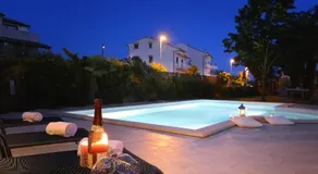 Villa Andrija Family Dream with heated pool at the sea with beautiful garden, outside cinema and kids playground - Image 5