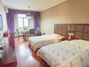 Taohuazhixing Hotel - Image 4
