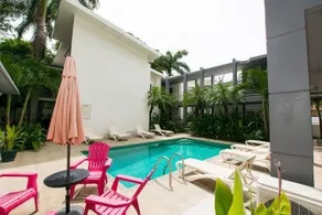 Brand-new 4-bedroom luxury home with pool near beach - Image 1