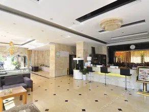 Riyuexin Business Hotel - Image 4