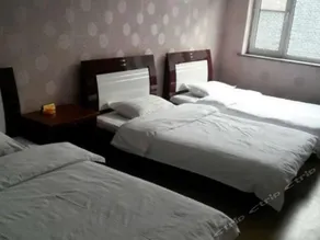 Pujing Hotel - Image 4
