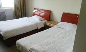 Qinghua Business Hotel - Image 5