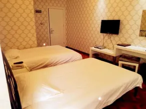 Longbai Business Hotel - Image 3
