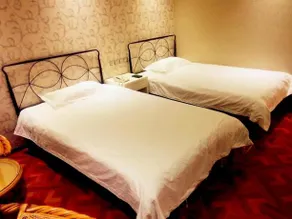 Longbai Business Hotel - Image 4