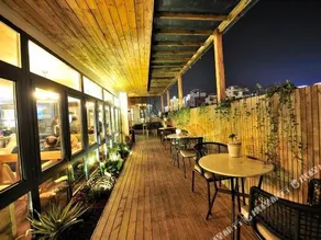 Huixin Holiday Hotel - Image 3