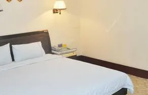 Magnolia Business Hotel (Yantai Longkou Heping Road Branch) - Image 4