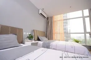 Mingren Shijia Business Hotel - Image 5