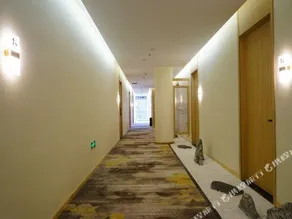 Huixin Holiday Hotel - Image 5