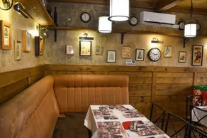 Clock Cafe Pizzeria Es Panzio - Image 3