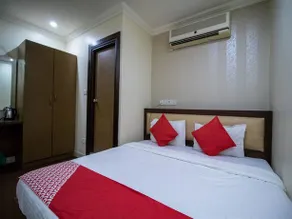 Imax Inn by OYO Rooms - Image 5