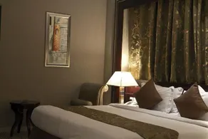 Capital O 596 Garden Palace Hotel - Image 3