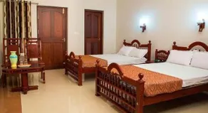 FabHotel Alakkal Residency - Image 4