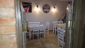 Clock Cafe Pizzeria Es Panzio - Image 2