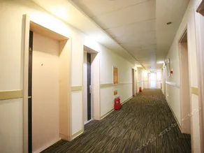 Baishu Kuaijie Hotel - Image 4