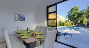 Villa Andrija Family Dream with heated pool at the sea with beautiful garden, outside cinema and kids playground - Image 3