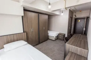 POZITIF SUITES - Image 1